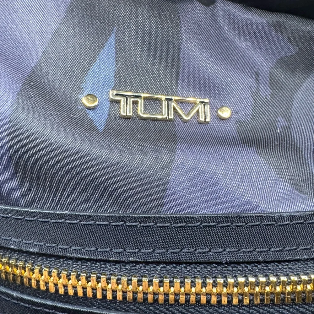 Tumi reposhing backpack